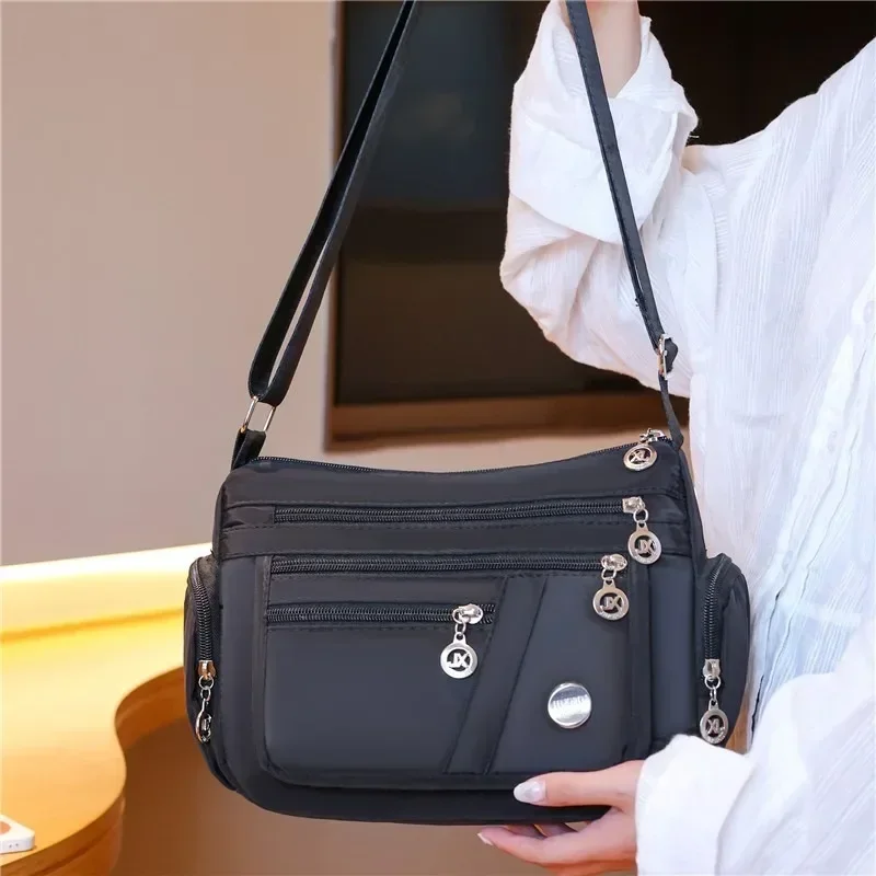 Multifunctionele crossbodytas  - Accordion Wallet Zip recensie en prijs
